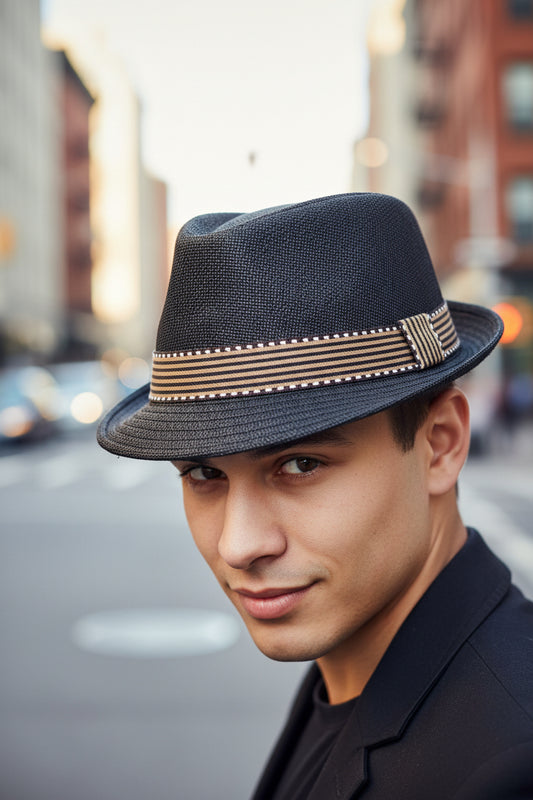 Black fedora hat with a brown striped band on a white background