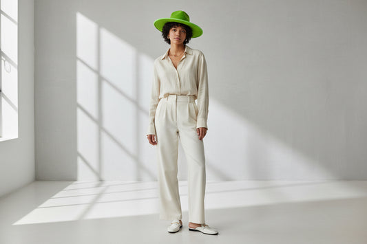 Green hat with a wide brim on a white background