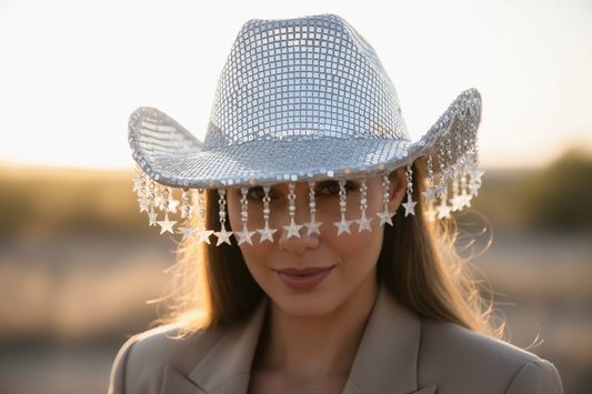 Silver mesh cowboy hat with fringes on a white background