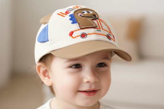 Children's cap with cartoon face and 'Hello!' text on a white background