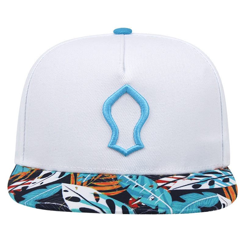 A blue polyester baseball cap with a beige brim featuring a geometric pattern. The cap has an embroidered logo on the front.