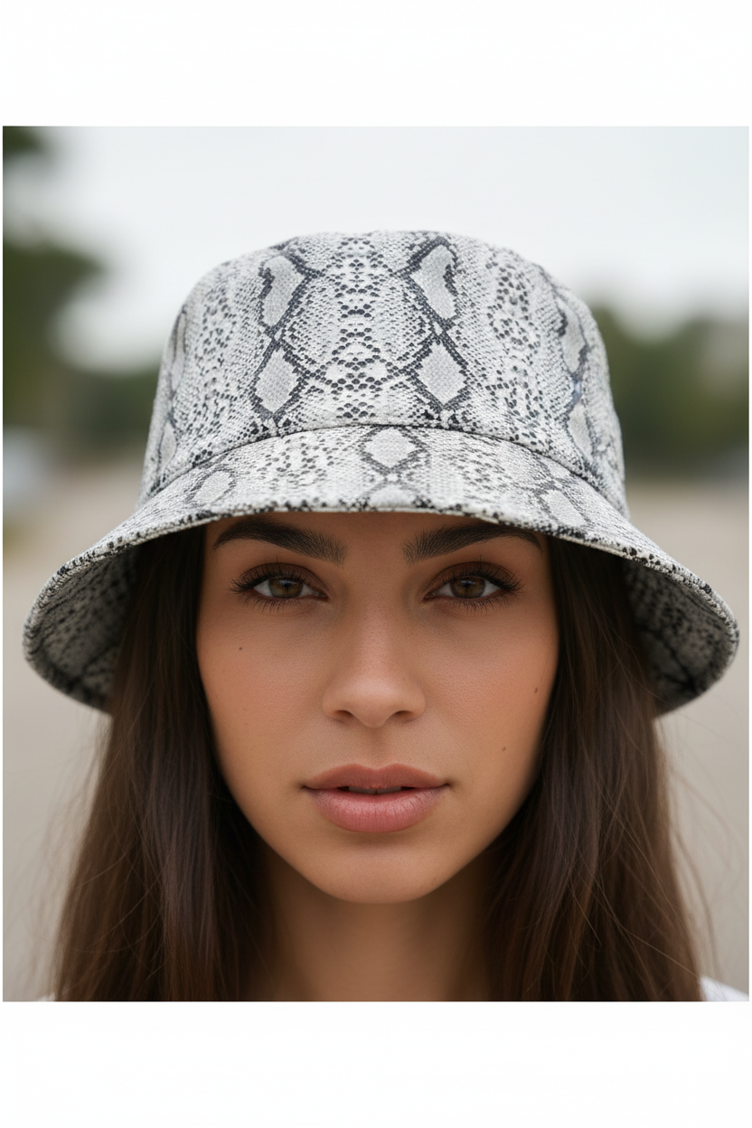 A fisherman hat with a snake print pattern.