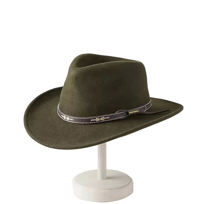 Green cowboy hat on a white stand against a light gray background