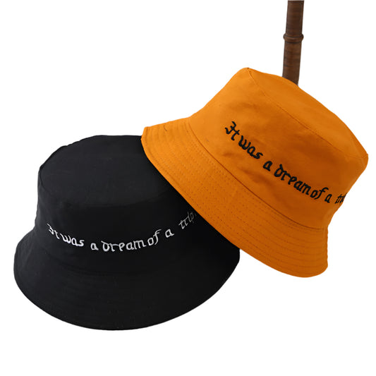 Two bucket hats, one black and one orange, with text on a light background.