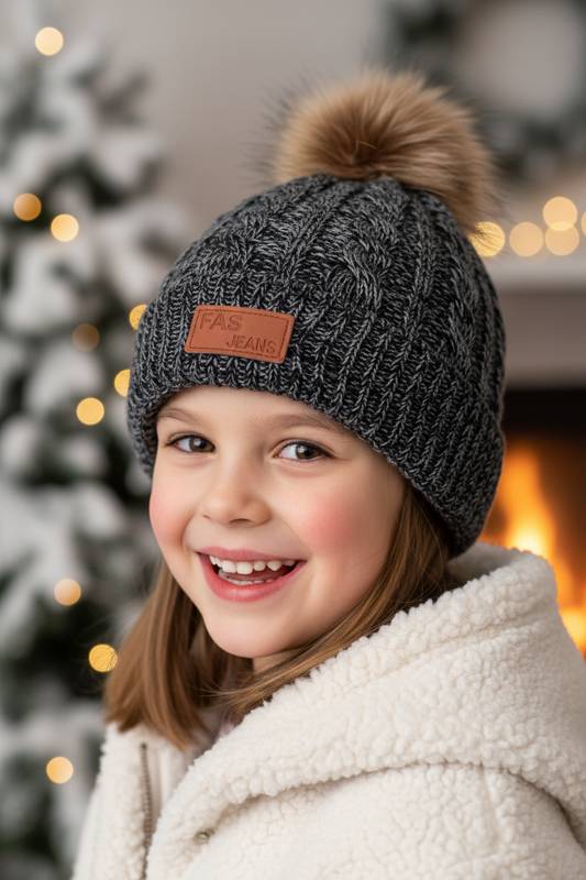 Gray knit beanie with pom-pom, gloves, and scarf set on a white background