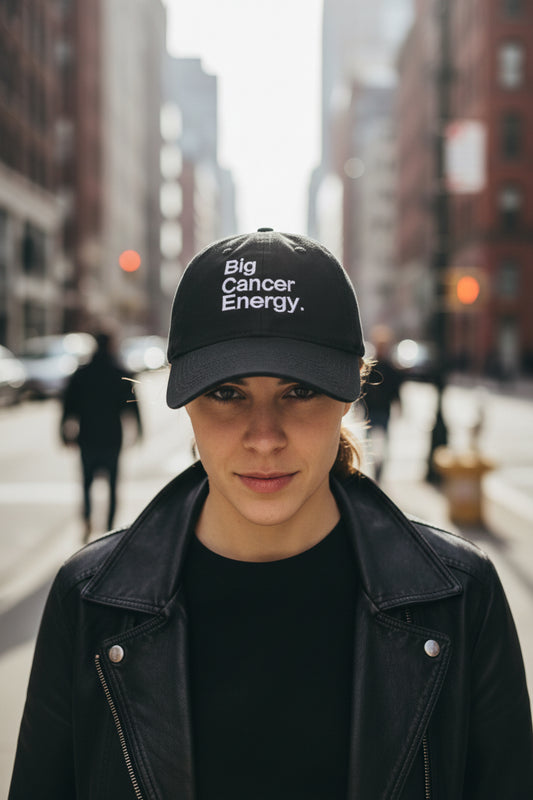 Black cap with 'Big Cancer Energy' text on a white background