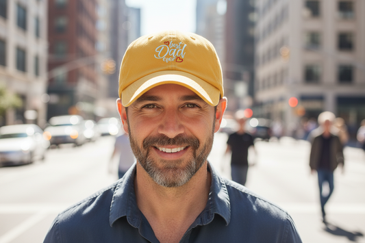 Yellow cap with 'best dad ever' text and hearts on a white background