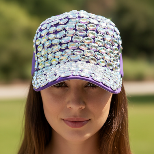 Blue cap with colorful gemstones on a white background