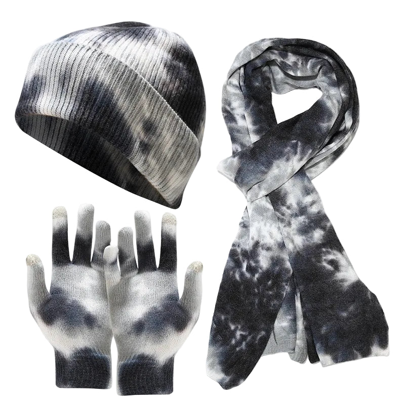 Set of tie-dye hat, scarf, and gloves on a white background