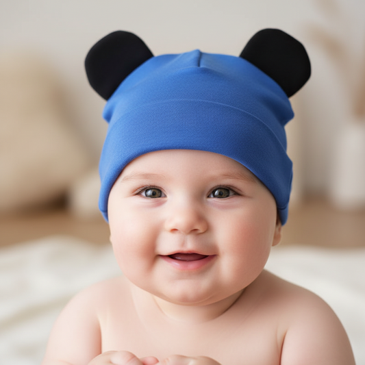 A gray baby hipster hat with non-woven fabric designed with mouse ears.